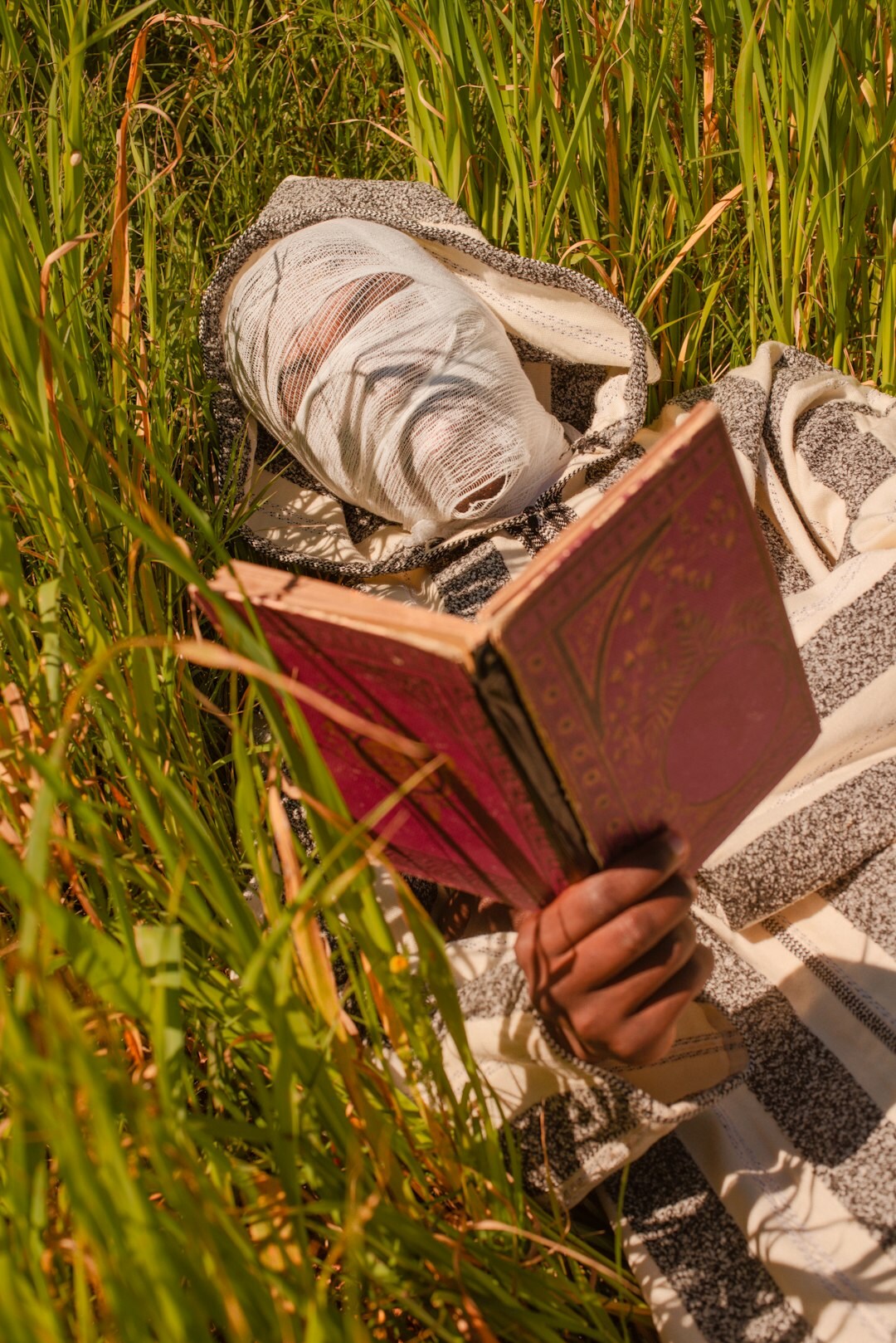 detective reading old book